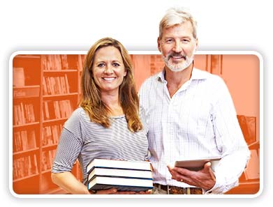Couple carrying books at bookstore. Find business insurance.